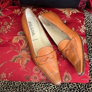 Enjoy your life in Prada, kitten heels in a luxe, Vero Cucio camel leather.